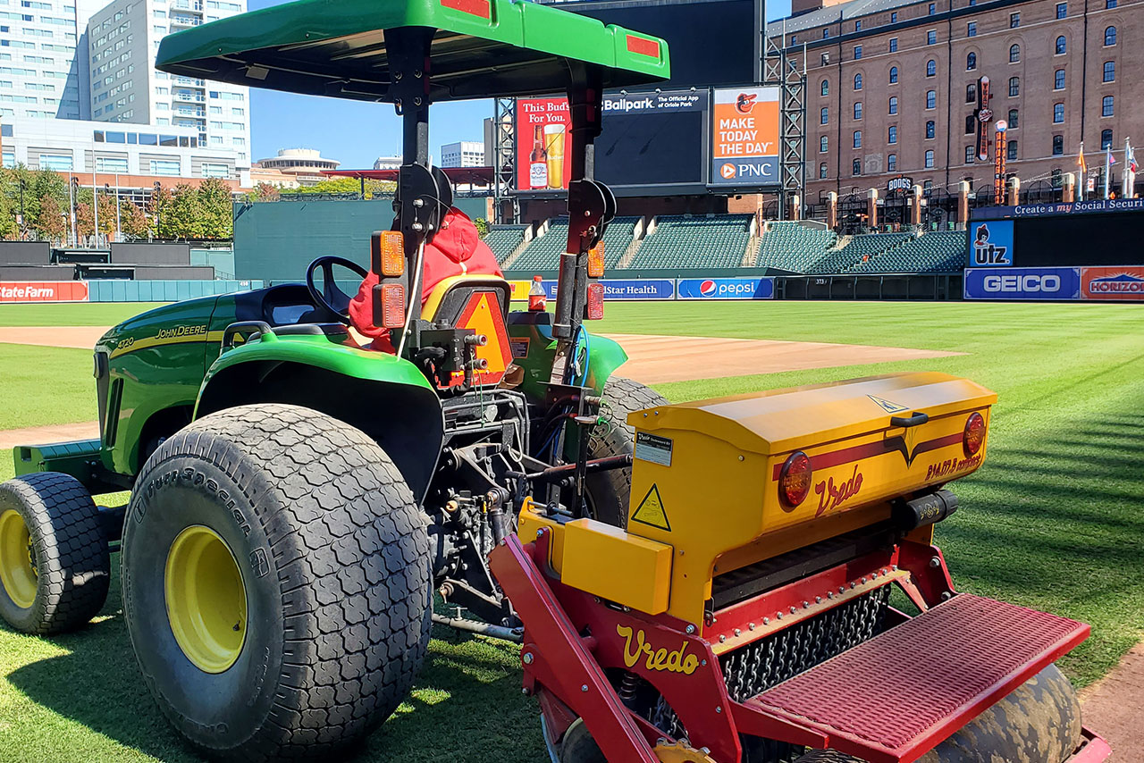 Projects implements Vredo overseeder athletic turf maintenance baltimore
